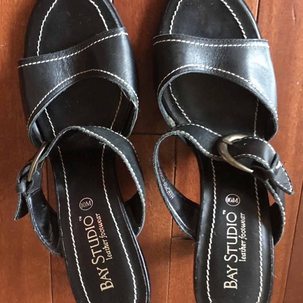 Never worn. Really cute slip on sandal type heels.